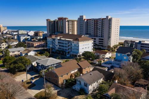 an aerial view of a city with buildings and the ocean at 1408 Perrin Dr, Unit A - Ocean Walk Sleeps 8 in Myrtle Beach