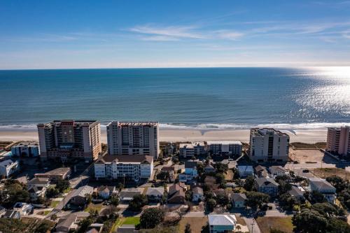 an aerial view of the beach and buildings at 1408 Perrin Dr, Unit A - Ocean Walk Sleeps 8 in Myrtle Beach