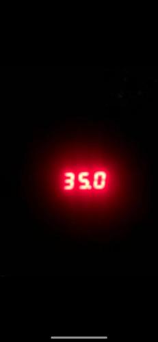 a red traffic light in the dark at Costa Villa in Atlántida