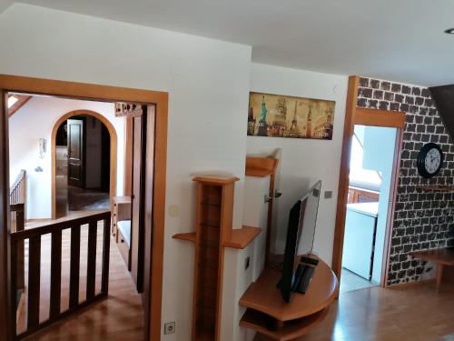 TV a/nebo společenská místnost v ubytování Sunshine Apartment