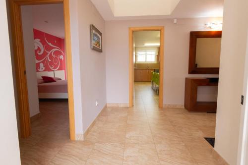 a hallway with a room with a bed at Catalunya Casas Tranquil Paradise, Private Pool and only 200 meters to beach! in L'Ampolla