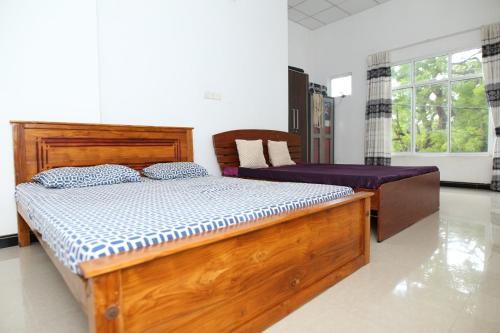 Giường trong phòng chung tại Sujee's Guest House with Two Bed Rooms