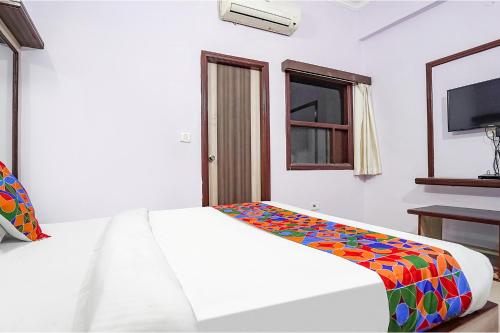 Cama ou camas em um quarto em Hotel Premium Golden Era
