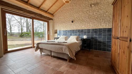 la Grange du Landorreにあるベッド