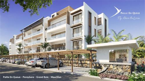an architectural rendering of a building with cars parked in front at Paille en Queue apartment in Grand Baie
