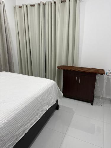 Кровать или кровати в номере Mode apartment non ac room