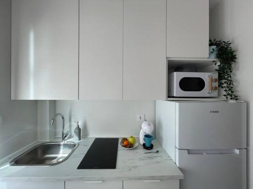 Η κουζίνα ή μικρή κουζίνα στο Apartamento Verde en Sotogrande