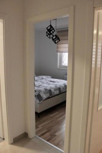 Postel nebo postele na pokoji v ubytování Sun&Moon