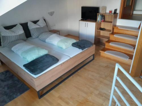 Ліжко або ліжка в номері Ferienwohnung Bergblick