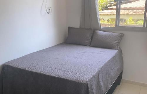 Giường trong phòng chung tại Club Vista do Atlântico