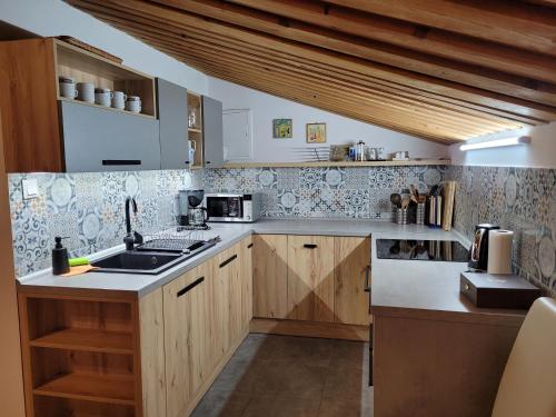 Kuchyň nebo kuchyňský kout v ubytování Family House - Apartmany Zuzana