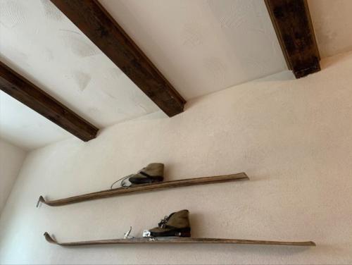 a pair of shoes on shelves on a wall at HAUS BRAILEN in Brilon Alme in Brilon