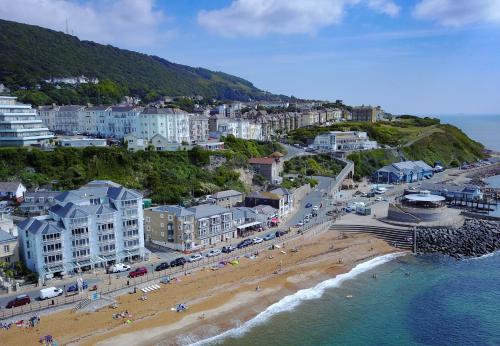 an aerial view of a beach with hotels and buildings at High Street Suites 3 in Ventnor