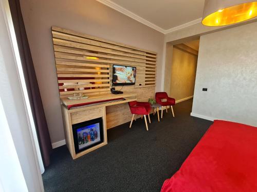 Μια τηλεόραση ή/και κέντρο ψυχαγωγίας στο Boutique Hotel Cattaleya