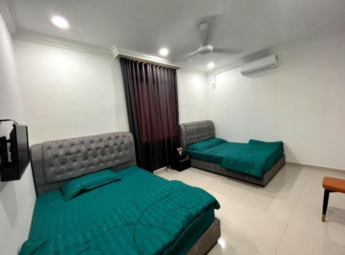 Voodi või voodid majutusasutuse Qiu's Event House Std Double Room toas