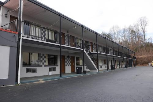 an empty building with a staircase on the side of it at Relax Inn in Collinsville