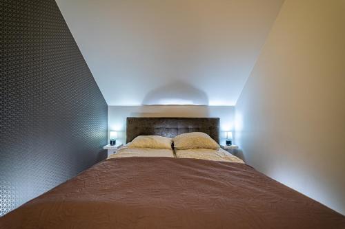 Posteľ alebo postele v izbe v ubytovaní MINIMAR Apartamenty Świeradów