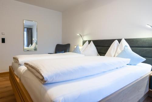 Cama o camas de una habitación en Pension Appartements Alpenblick