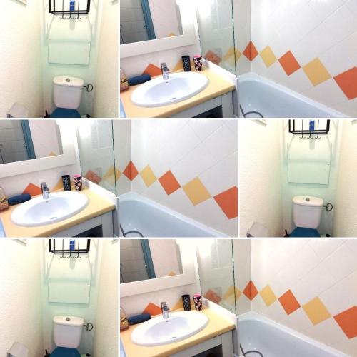 uma casa de banho com um lavatório e um espelho em Sleep in Cannes between sea and mountains em Cannes