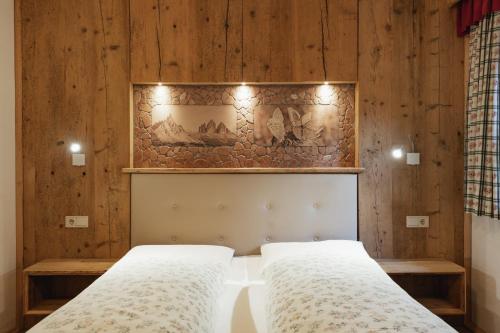 Una cama o camas en una habitación de Leithäusl