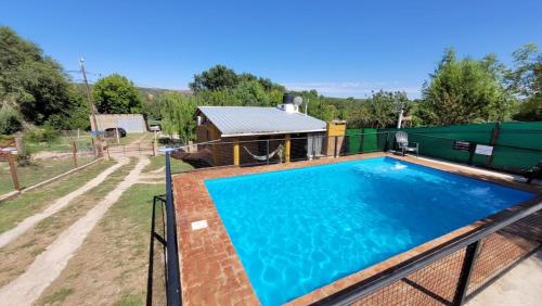 Swimmingpoolen hos eller tæt på Mi Recreo CABAÑAS