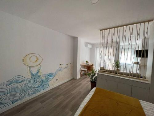 En eller flere senge i et værelse på Apartamento Azul en Sotogrande