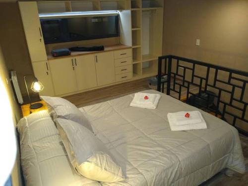 Postel nebo postele na pokoji v ubytování Los Maquis e Inacayal