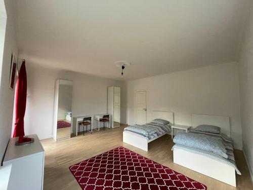 Rúm í herbergi á Spacious room in shared accommodation