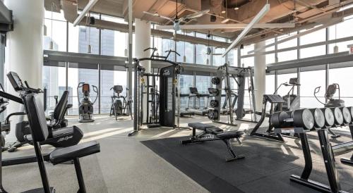 a gym with several treadmills and cardio machines at NVCLL Chicago in Chicago