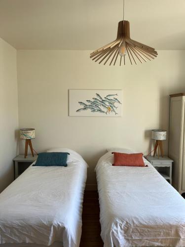 Posteľ alebo postele v izbe v ubytovaní Les Bains de Trouville
