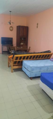 1 dormitorio con 2 camas en una habitación en Ph en Las Toninas