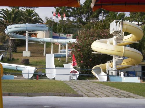 a water park with a slide in the middle at Dream House On The Beach in Figueira da Foz