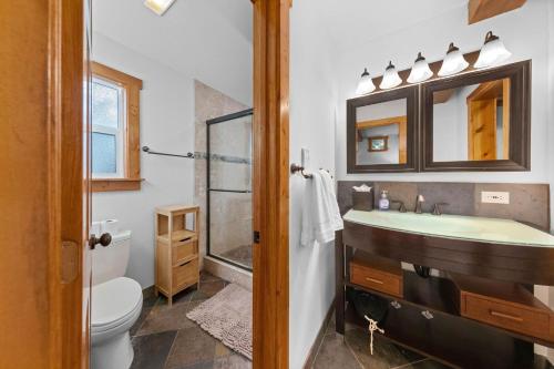 a bathroom with a sink and a toilet at Hideaway in the Highlands - 4BR, Pet Friendly w Hot Tub - Minutes from the Lake & Tahoe City in Tahoe City