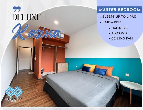 a bedroom with a bed and a sign on the wall at Roxy Sematan Beach Townhouse Deluxe , 1 & 2 in Sematan