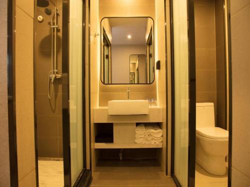 Phòng tắm tại LanOu Hotel Zoucheng Yankuang Iron Transport Office