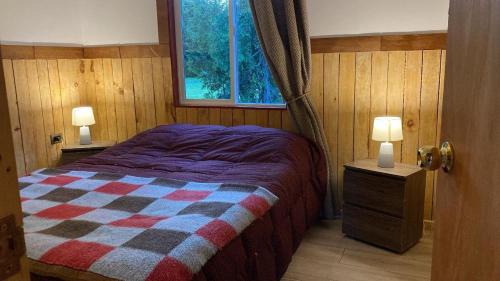 Ένα ή περισσότερα κρεβάτια σε δωμάτιο στο Cabaña el olivo