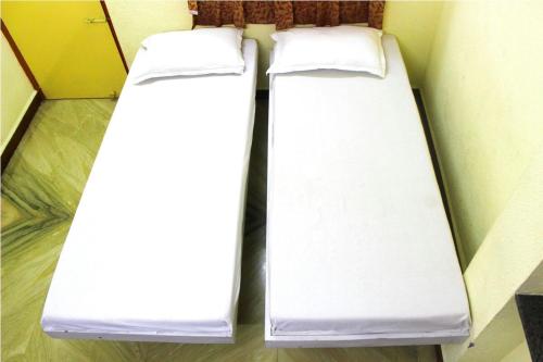 Posteľ alebo postele v izbe v ubytovaní PMS INN