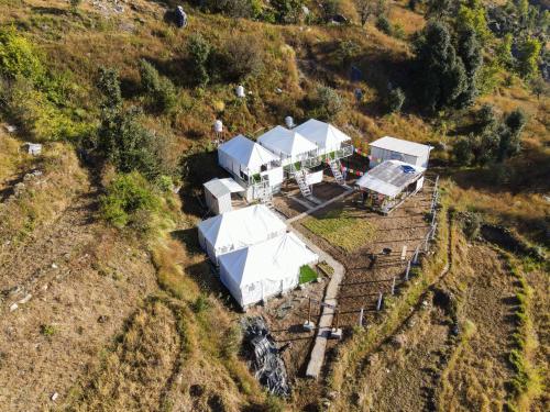 an aerial view of a house on a hill at Sari Highlands in Sari