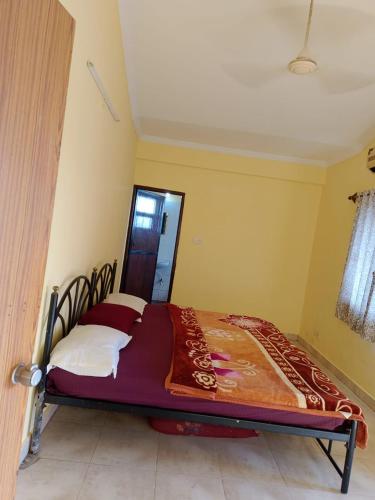 Un pat sau paturi într-o cameră la Baga the pool resort
