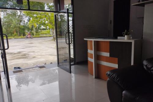 Фотография из галереи Hotel O Losmen Karunia Katingan Near Kantor Sekretariat PPK Katingan Kuala в городе Pagatan