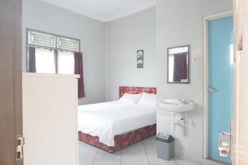Ένα μπάνιο στο Hotel O Guest House Zidan 21