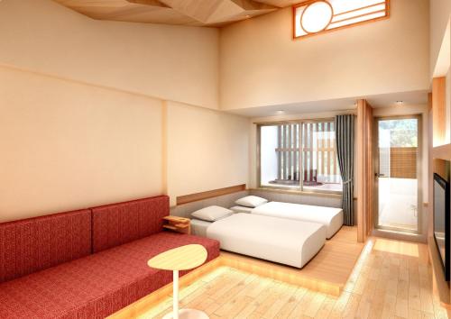 uma sala de estar com uma cama e um sofá em Ichinoyu Shinkan em Hakone