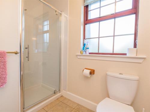 a bathroom with a shower and a toilet at 1 Bed in Applecross CA186 in Applecross