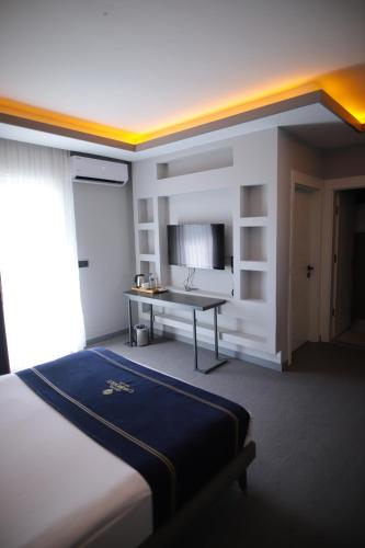 Katil atau katil-katil dalam bilik di GRAND ÇAKIROĞLU HOTEL