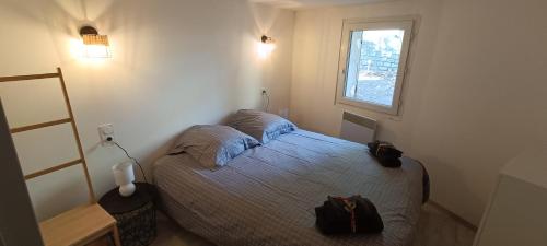 Postel nebo postele na pokoji v ubytování Gîte de Jastres