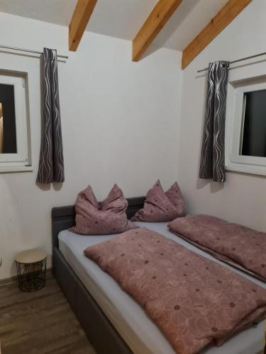 Katil atau katil-katil dalam bilik di NEU! Ferienhaus am See