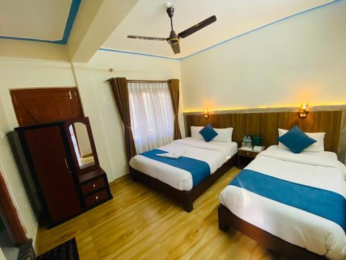 Postel nebo postele na pokoji v ubytování Hotel Mountain Dream