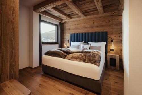 Ένα ή περισσότερα κρεβάτια σε δωμάτιο στο Luxury Chalet P