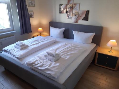 En eller flere senge i et værelse på Haus Miramar Nr 20