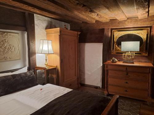 Letto o letti in una camera di Altfraenkische Weinstube